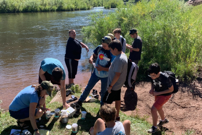 Students learning outdoors in nature